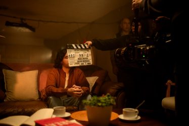 A film crew is preparing to shoot a scene